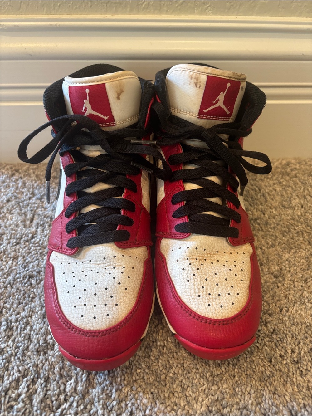 Jordan Kids Red and White High-Top Baseball cleats with Black Laces